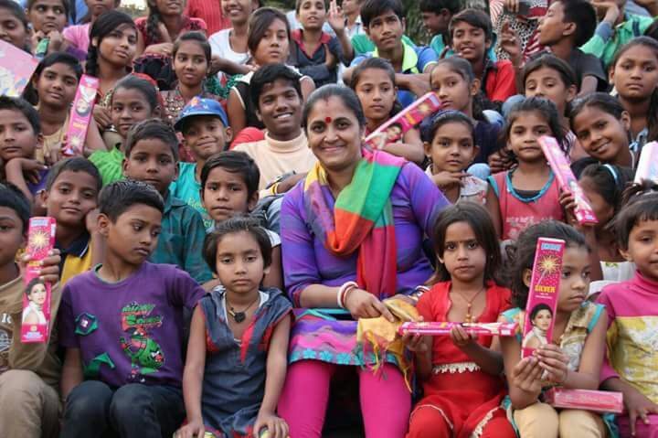 Museum School children seated together with a teacher